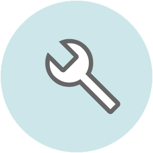 Wrench icon on light blue circular background representing maintenance and repair services.